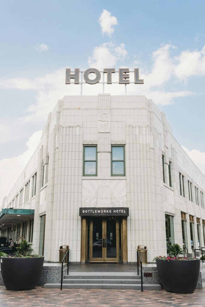 Facade of the iconic Bottleworks Hotel in Indianapolis showcasing Art Deco architecture.